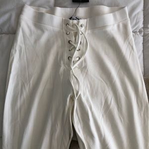 White flare pants